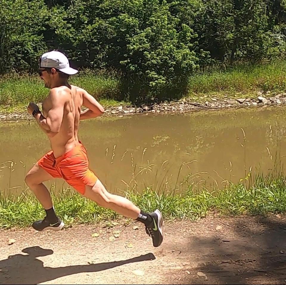 Patrick running on a trail