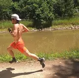Patrick running on a trail